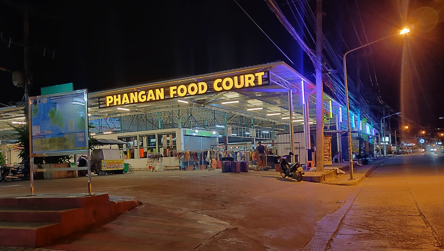 Exterior view of Phangan Food Court at night in Koh Phangan